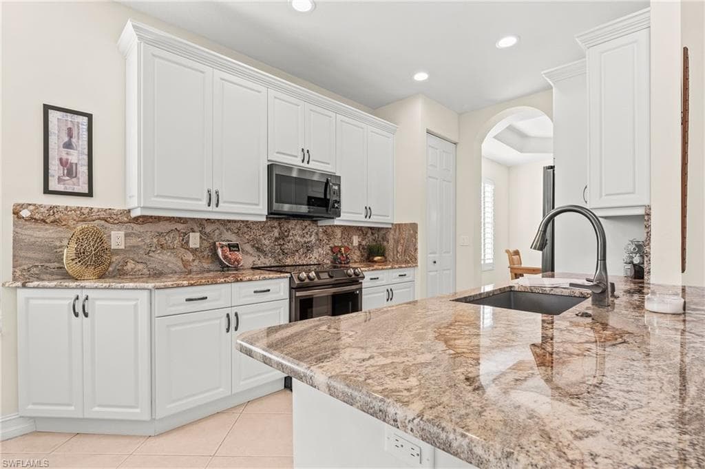 14478 Sterling Oaks Dr, Naples, FL 34110-9