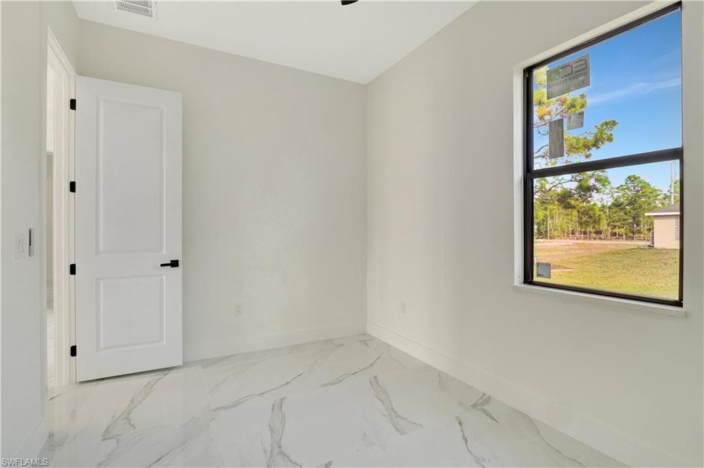 719 Fullerton Ave S, Lehigh Acres, FL 33974-23