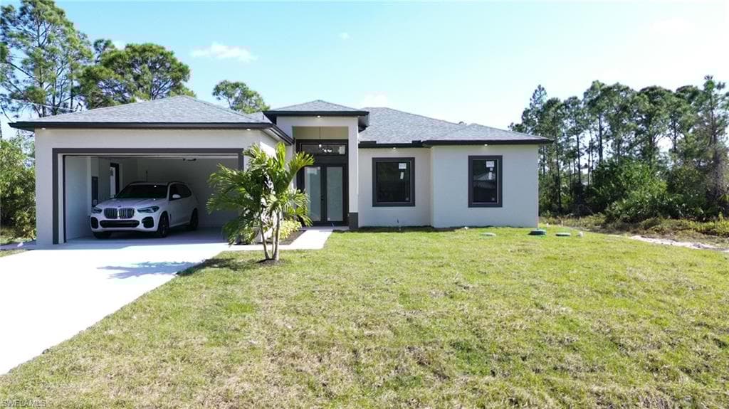 719 Fullerton Ave S, Lehigh Acres, FL 33974-4