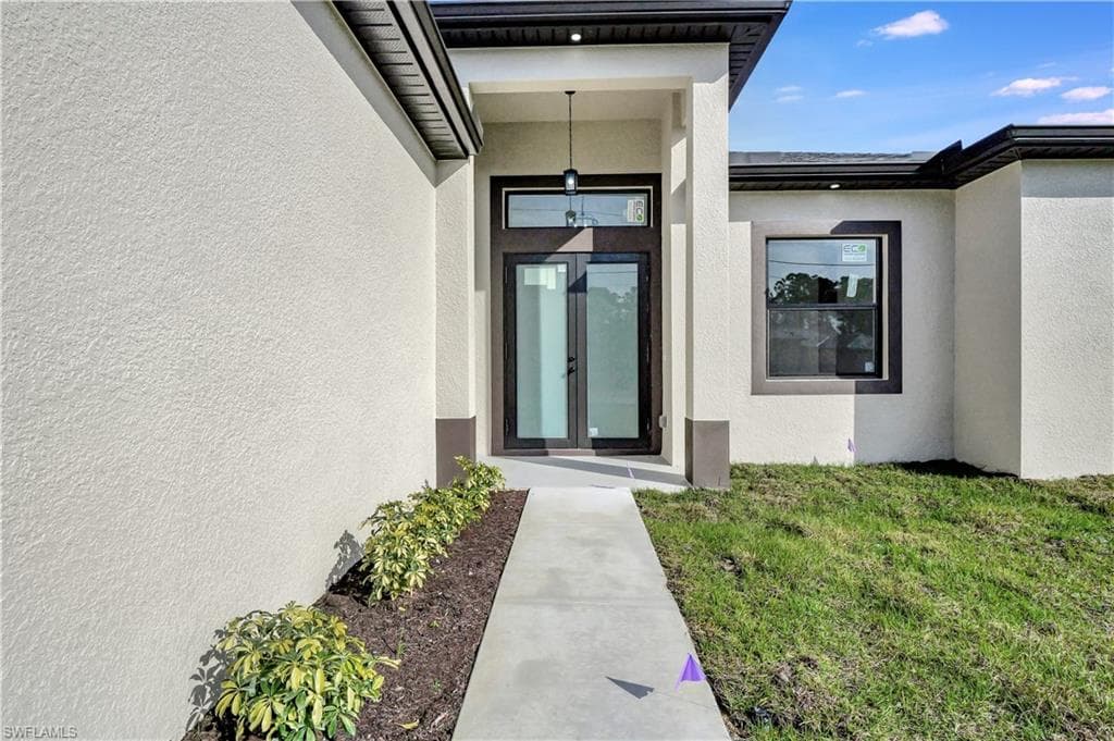 719 Fullerton Ave S, Lehigh Acres, FL 33974-6