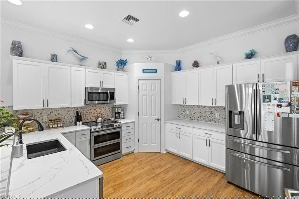 6750 Bent Grass Dr, Naples, FL 34113-9