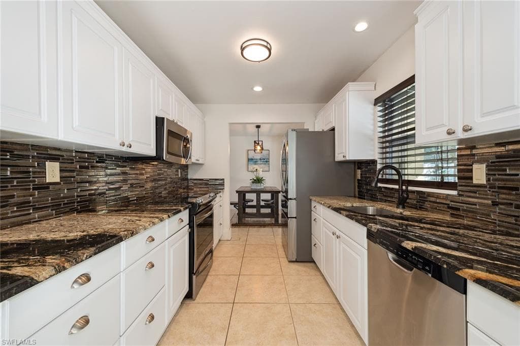 124 Flame Vine Dr, Naples, FL 34110-6