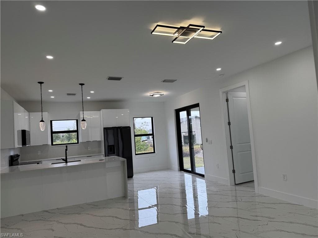 3107 9th St SW, Lehigh Acres, FL 33976-4