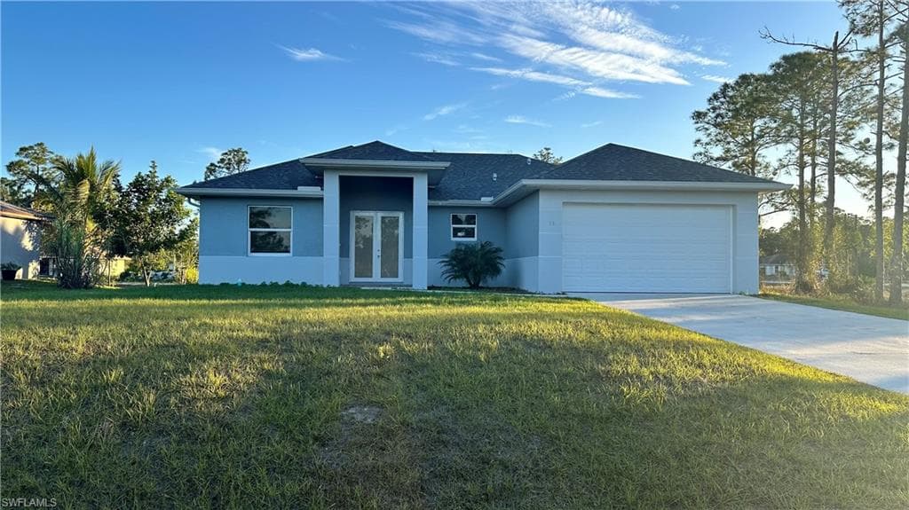 606 Ames St E, Lehigh Acres, FL 33974-1