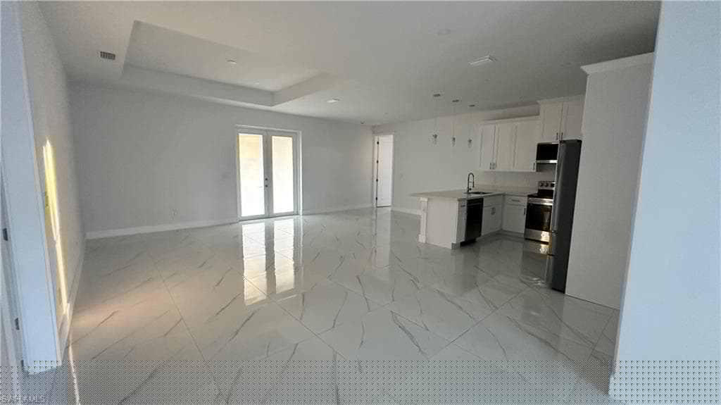 606 Ames St E, Lehigh Acres, FL 33974-6