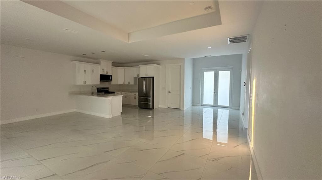 606 Ames St E, Lehigh Acres, FL 33974-7