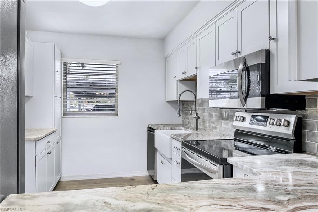 1348 Myerlee Gardens Ave, Fort Myers, FL 33919-2