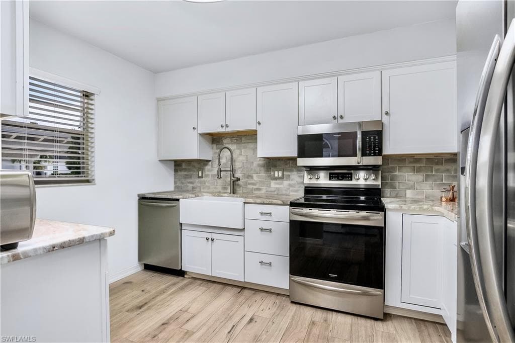 1348 Myerlee Gardens Ave, Fort Myers, FL 33919-4