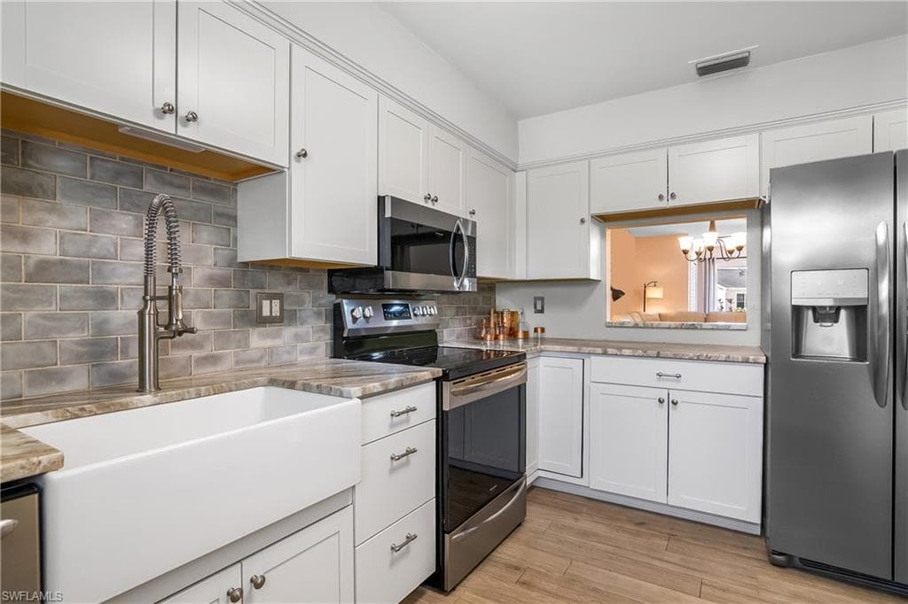 1348 Myerlee Gardens Ave, Fort Myers, FL 33919-5