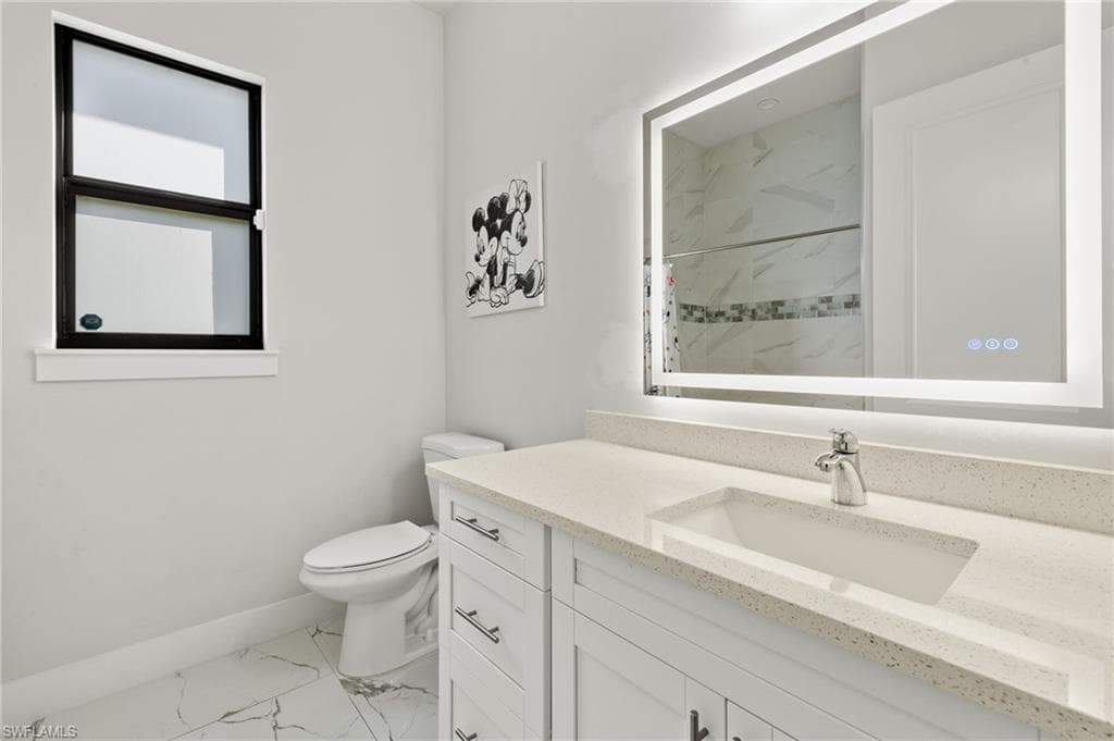 922 14th Ave NE, Naples, FL 34120-25