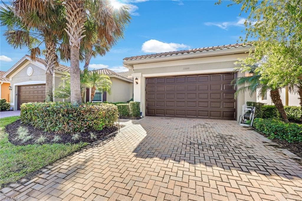 13371 Silktail Dr, Naples, FL 34109-1