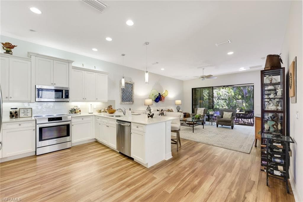 13371 Silktail Dr, Naples, FL 34109-6