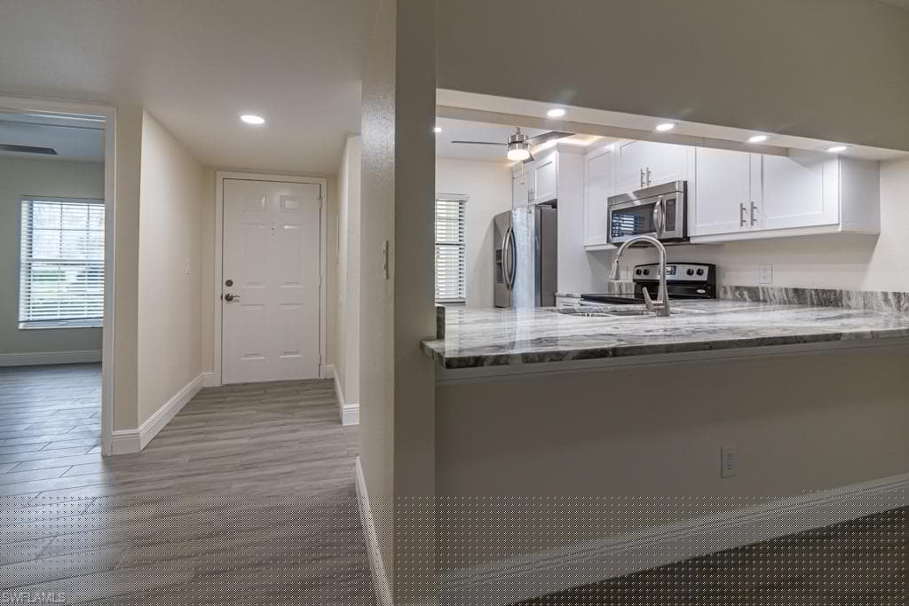2562 Kings Lake Blvd 102, Naples, FL 34112-5