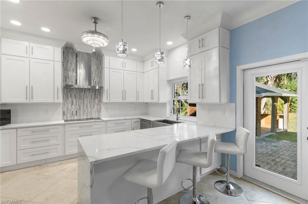 130 1st St NW, Naples, FL 34120-13