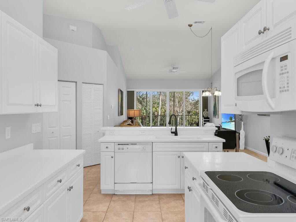 25050 Peacock Ln 201, Naples, FL 34114-9