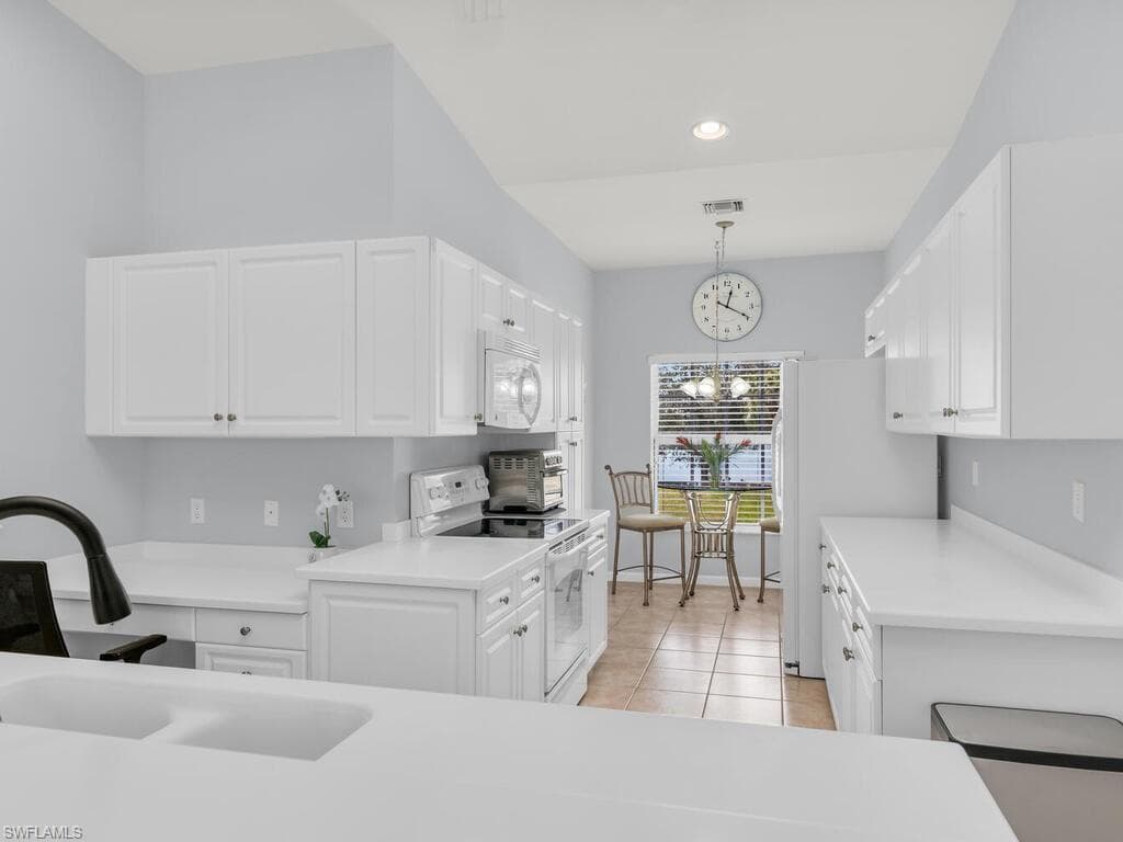 25050 Peacock Ln 201, Naples, FL 34114-6