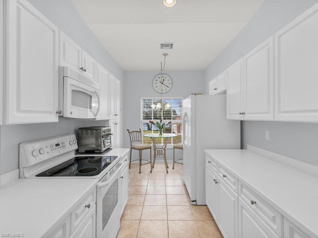 25050 Peacock Ln 201, Naples, FL 34114-7
