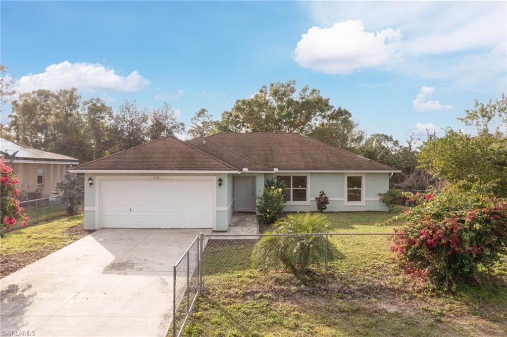 346 Columbus Blvd S, Lehigh Acres, FL 33974-2