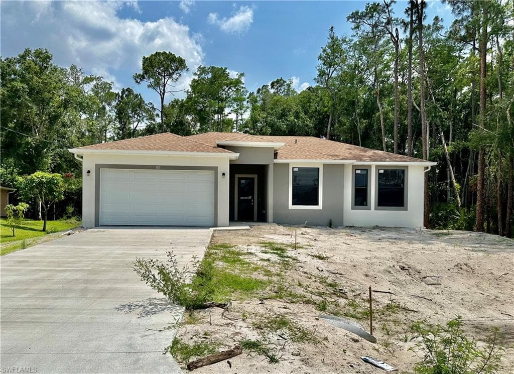 706 Glacier Ave, Lehigh Acres, FL 33974-1