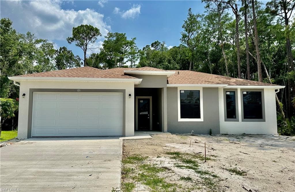 706 Glacier Ave, Lehigh Acres, FL 33974-3