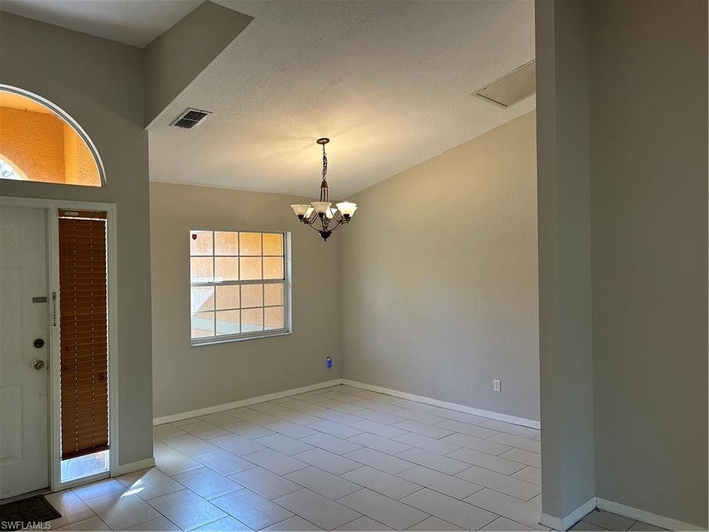 811 8th St NE, Naples, FL 34120-9
