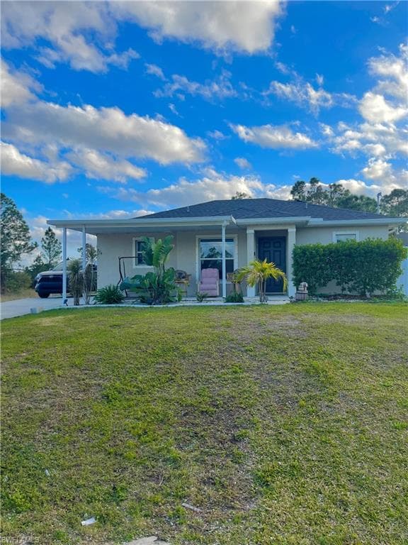 854 Campbell St E, Lehigh Acres, FL 33974-1