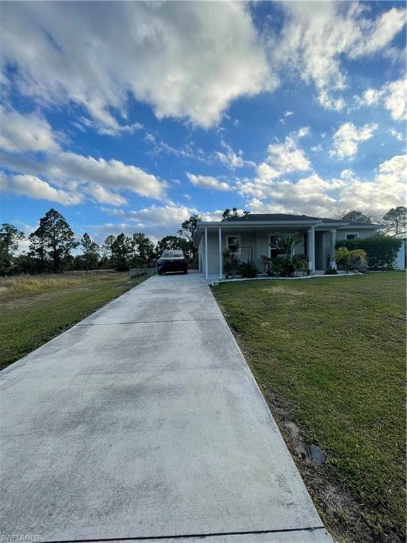 854 Campbell St E, Lehigh Acres, FL 33974-3