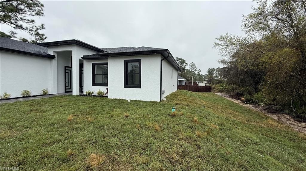 219 Malden Ave S, Lehigh Acres, FL 33974-9