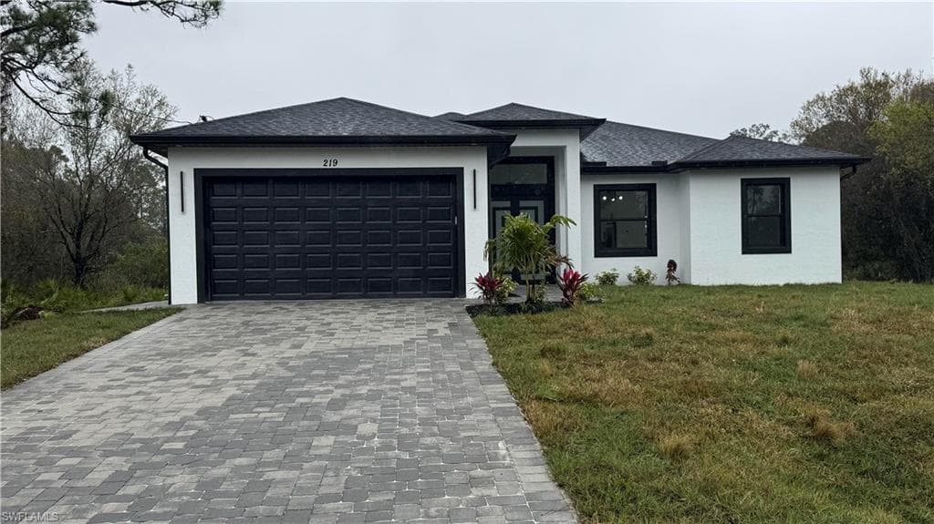 219 Malden Ave S, Lehigh Acres, FL 33974-1