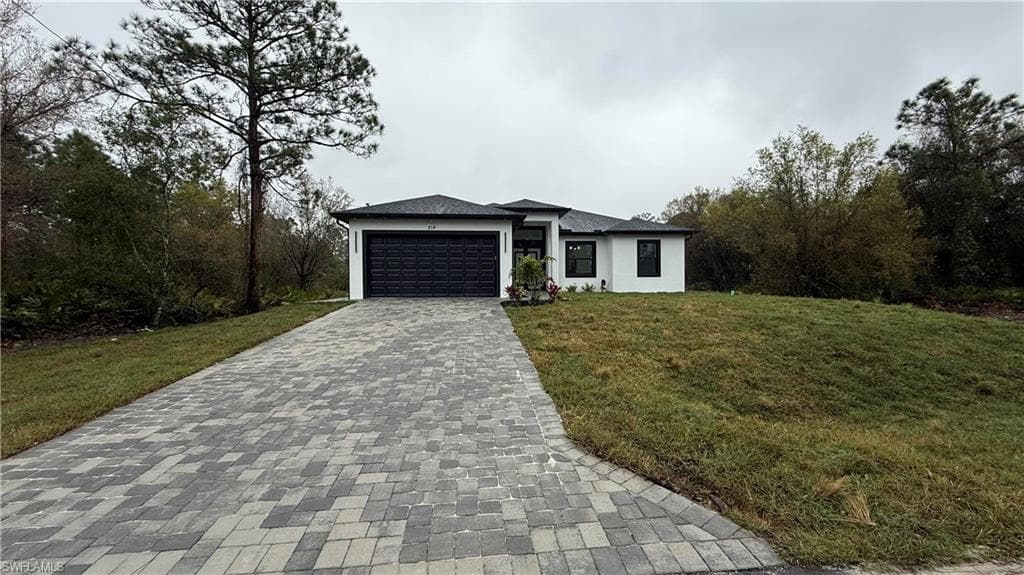 219 Malden Ave S, Lehigh Acres, FL 33974-2