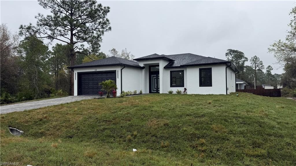 219 Malden Ave S, Lehigh Acres, FL 33974-3