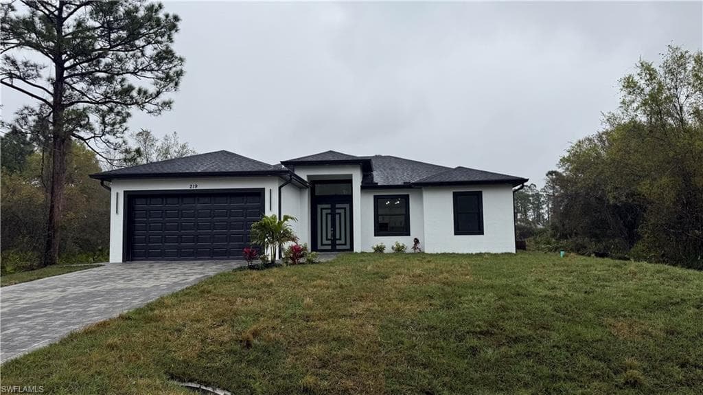 219 Malden Ave S, Lehigh Acres, FL 33974-4