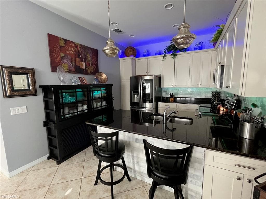 8494 Karina Ct, Naples, FL 34114-3