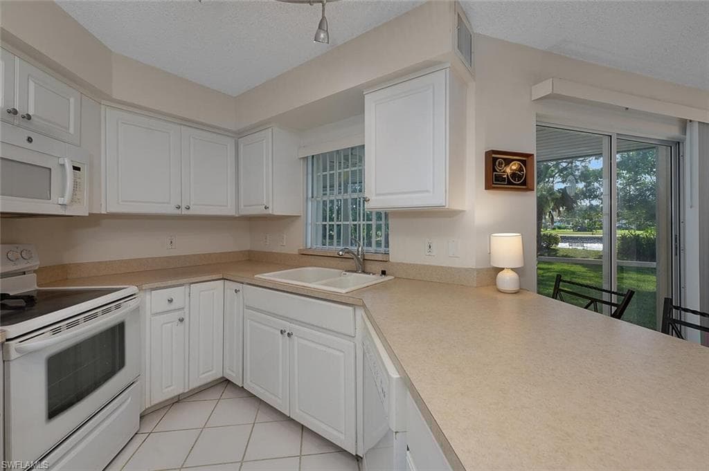 441 Quail Forest Blvd A101, Naples, FL 34105-9