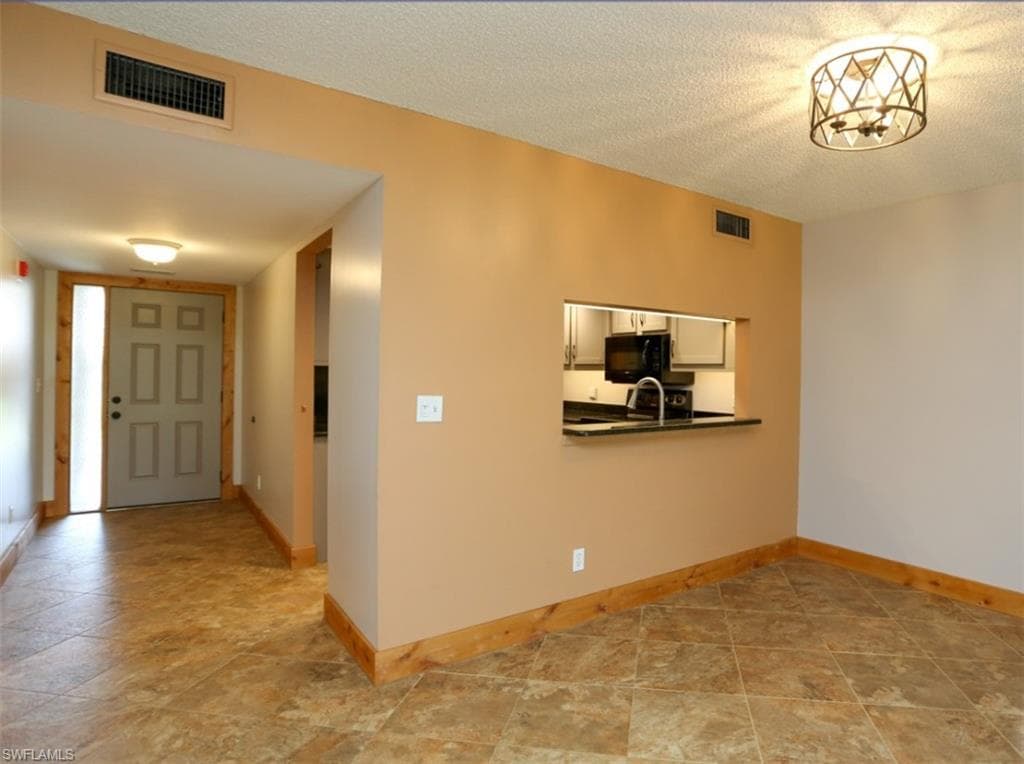 1782 Imperial Golf Course Blvd C-104, Naples, FL 34110-11