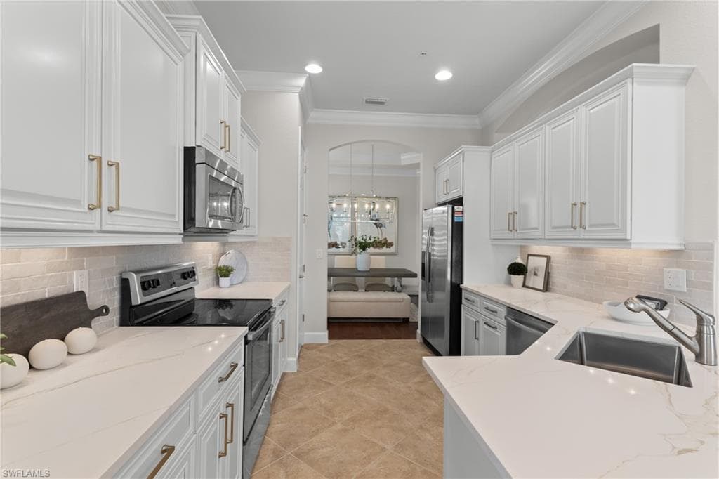 9557 Ironstone Ter 202, Naples, FL 34120-8