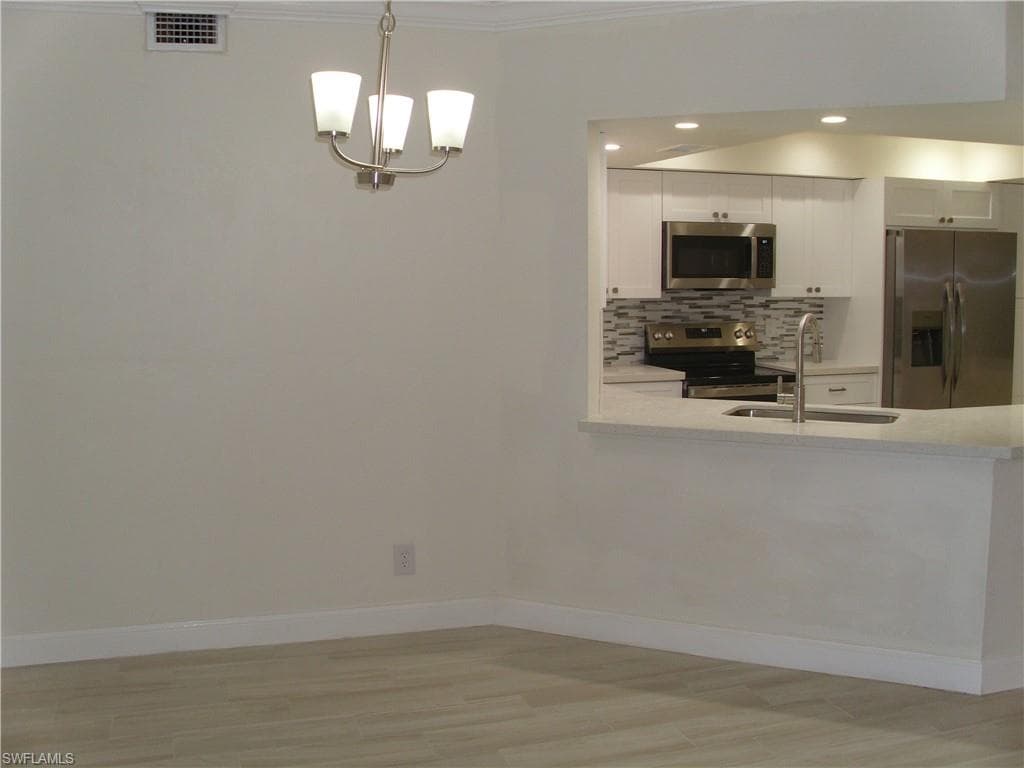 2671 Citrus Lake Dr E-102, Naples, FL 34109-4