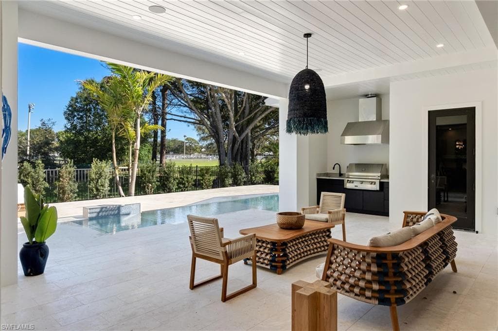 565 Whispering Pine Ln, Naples, FL 34103-42
