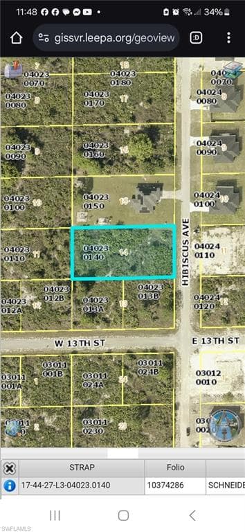 1303 Hibiscus Ave, Lehigh Acres, FL 33972-1