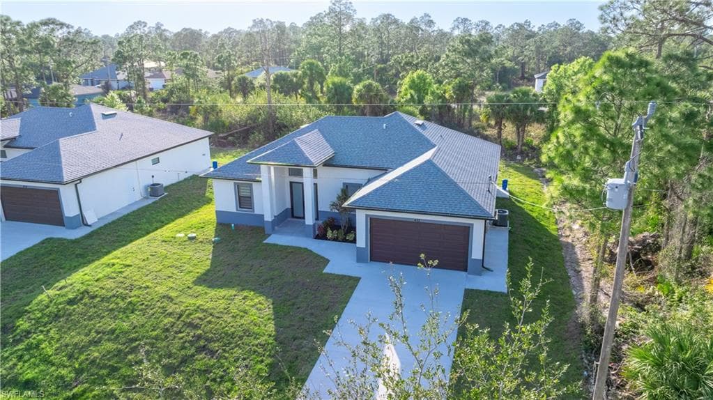 432 Mallory Ave S, Lehigh Acres, FL 33974-3