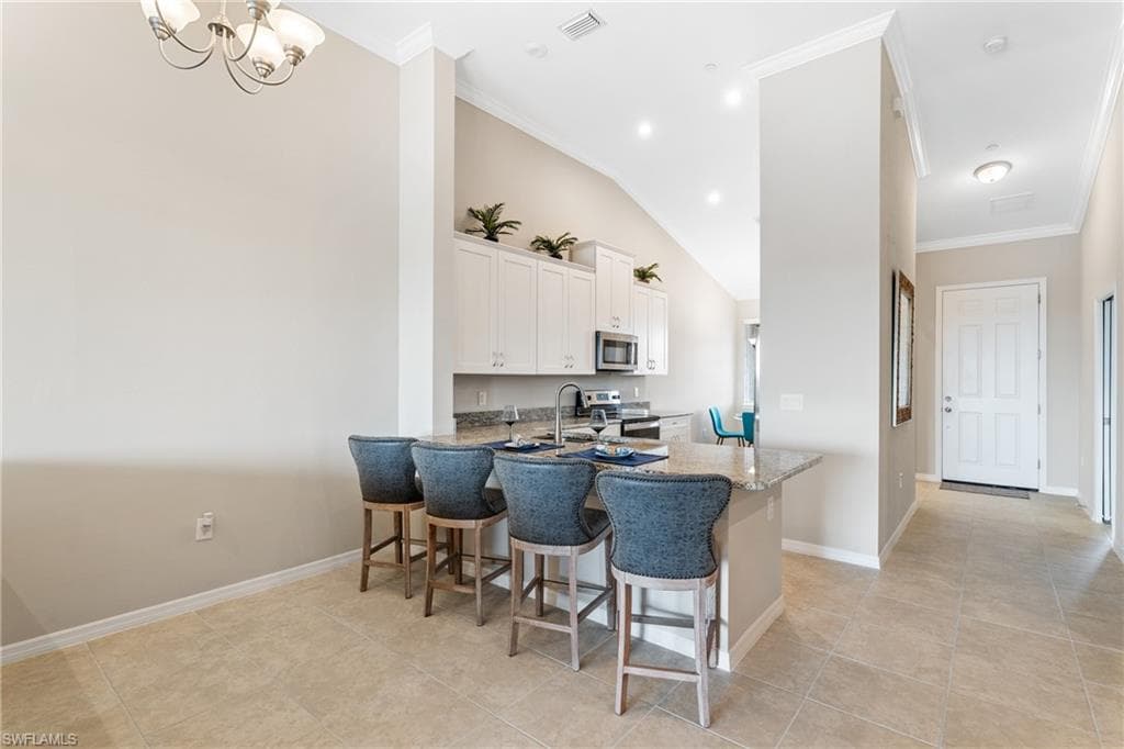 9365 Pocida Ct 203, Naples, FL 34119-8