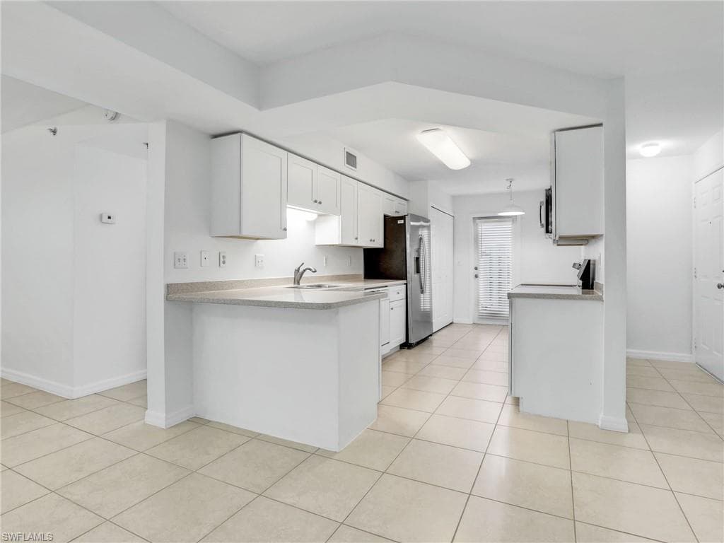 15405 Cedarwood Ln 104, Naples, FL 34110-9