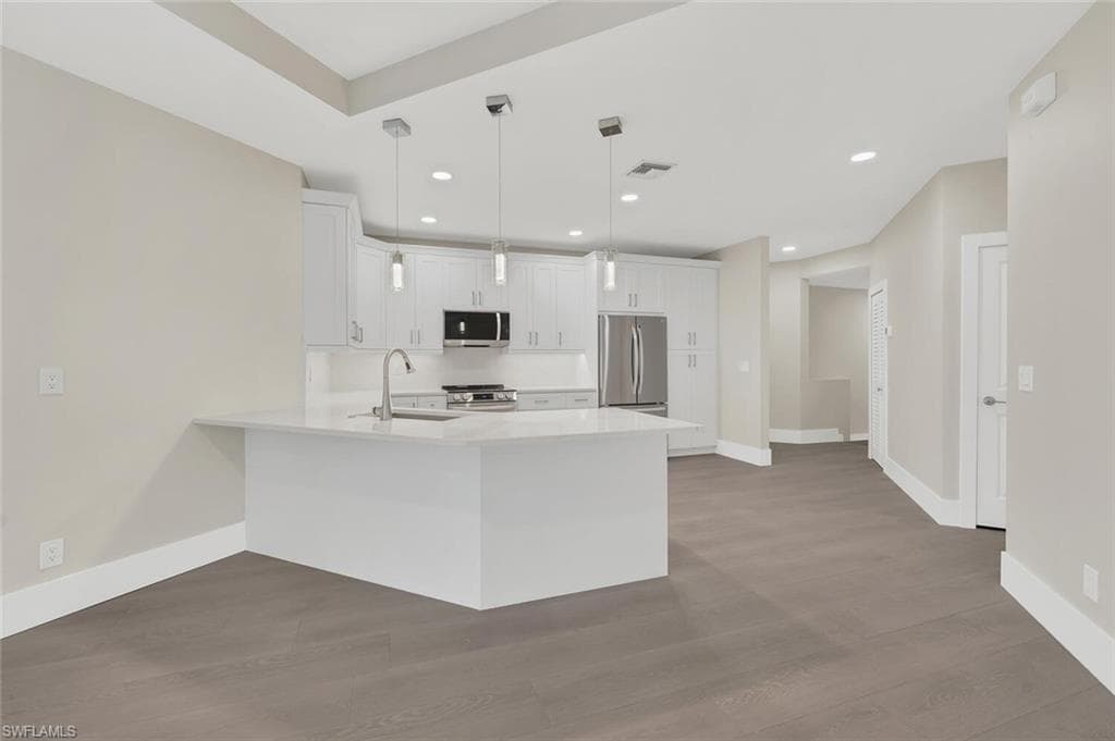 11408 Quail Village Way C-201, Naples, FL 34119-4