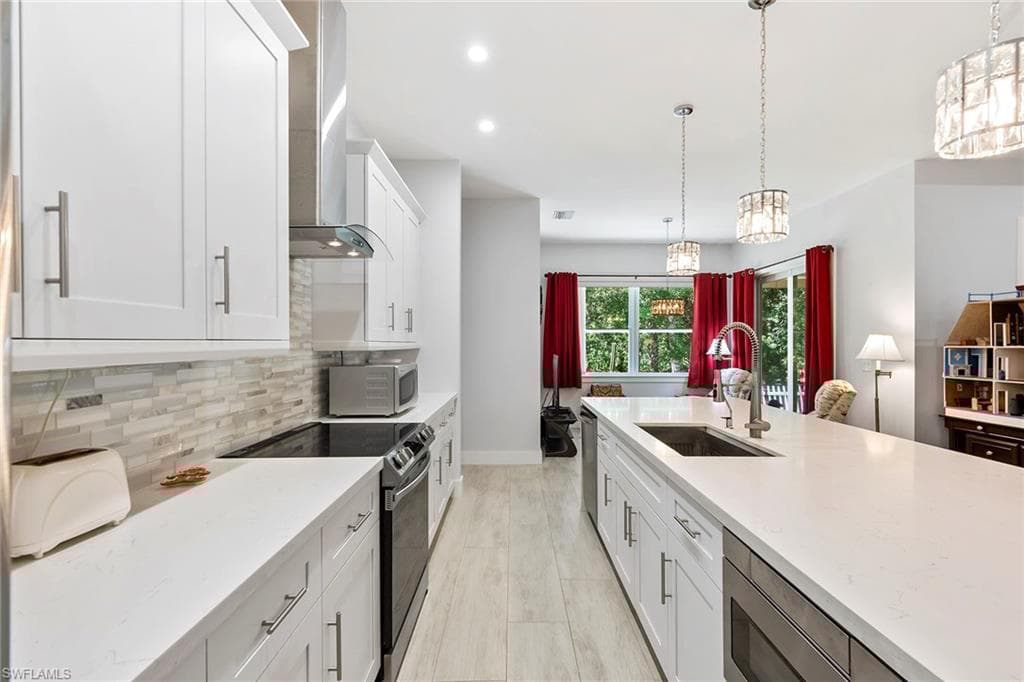235 6th St SE, Naples, FL 34117-14