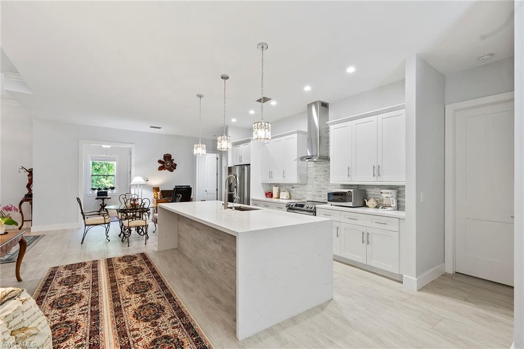 235 6th St SE, Naples, FL 34117-16
