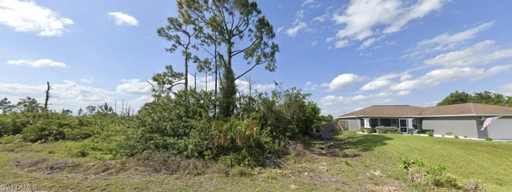649 Central St E, Lehigh Acres, FL 33974-3
