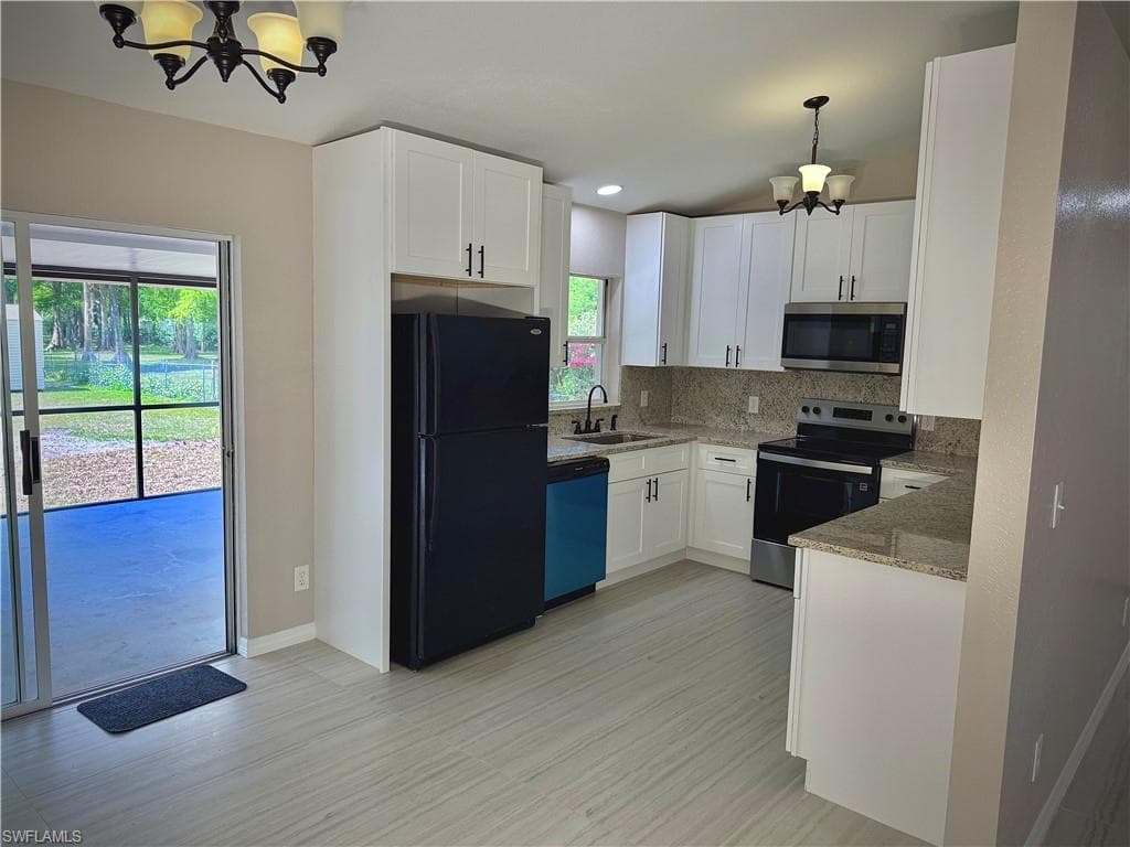 241 8th St SE, Naples, FL 34117-17