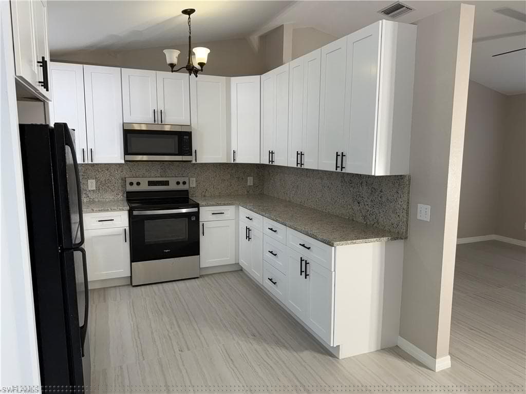 241 8th St SE, Naples, FL 34117-18