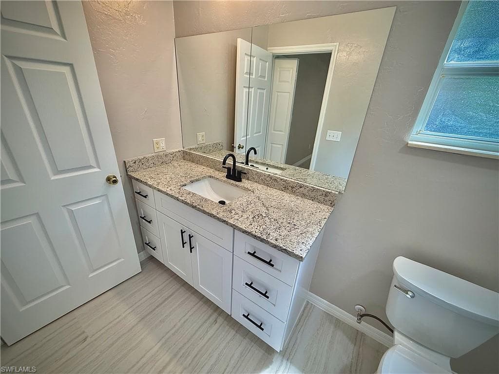 241 8th St SE, Naples, FL 34117-25