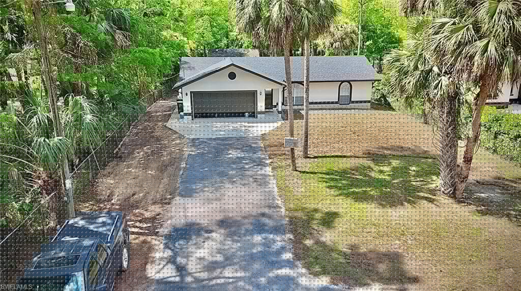 241 8th St SE, Naples, FL 34117-2
